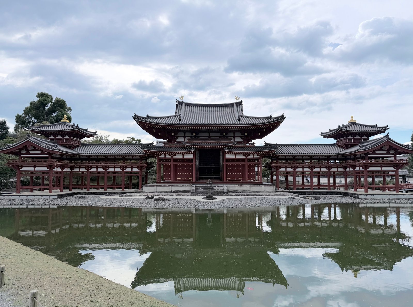 Temple buildings reflected in a pond